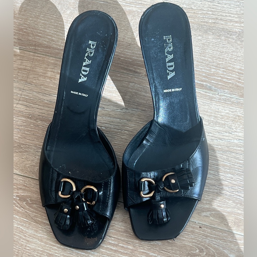 Prada Black Leather Mules with Tassel Detail